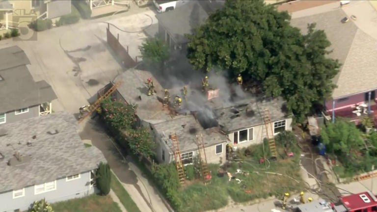 Crews battle raging house fire in East Los Angeles