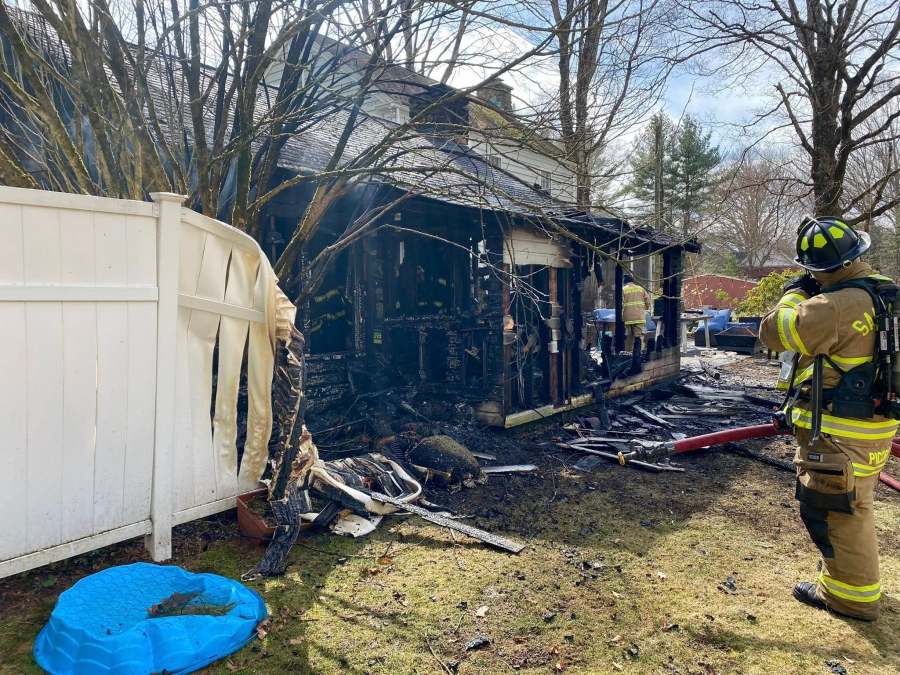 No injuries reported after garage fire on High Bridge Road in Newtown