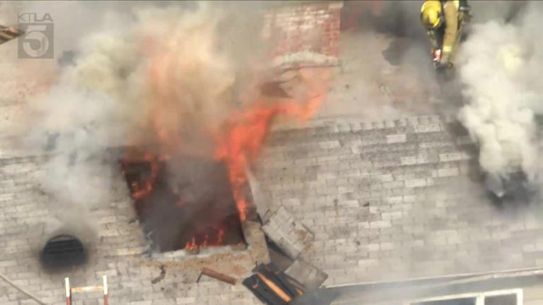 Crews battle raging house fire in East Los Angeles