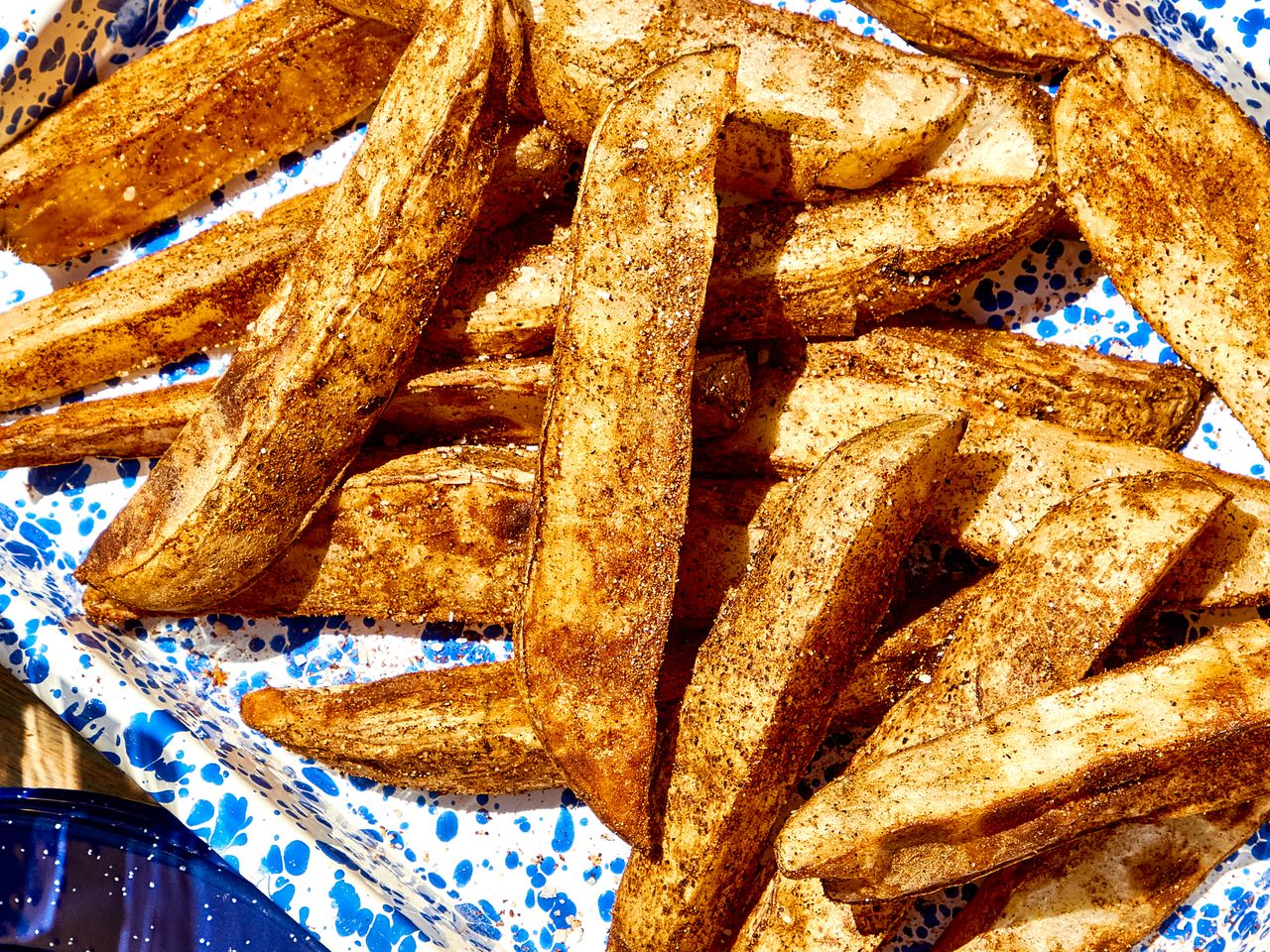 Grilled potato wedges on a plate