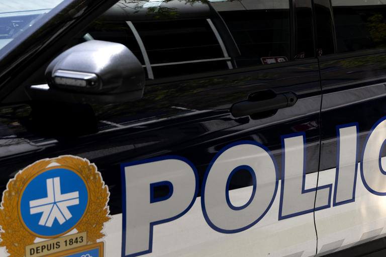 Montreal police vehicle set on fire near SPVM headquarters