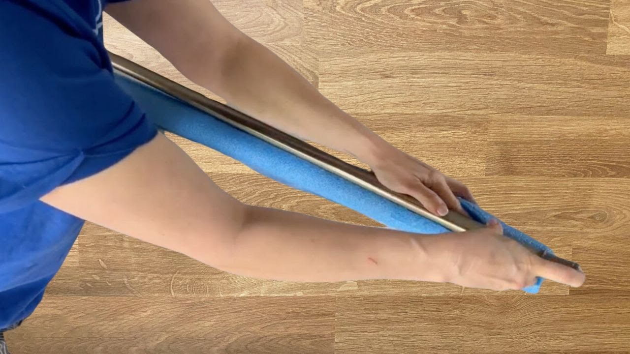 Stick a tension rod into a pool noodle for this genius kitchen idea!