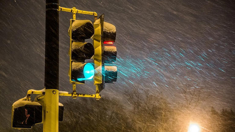 What those little scoops on top of traffic lights are for