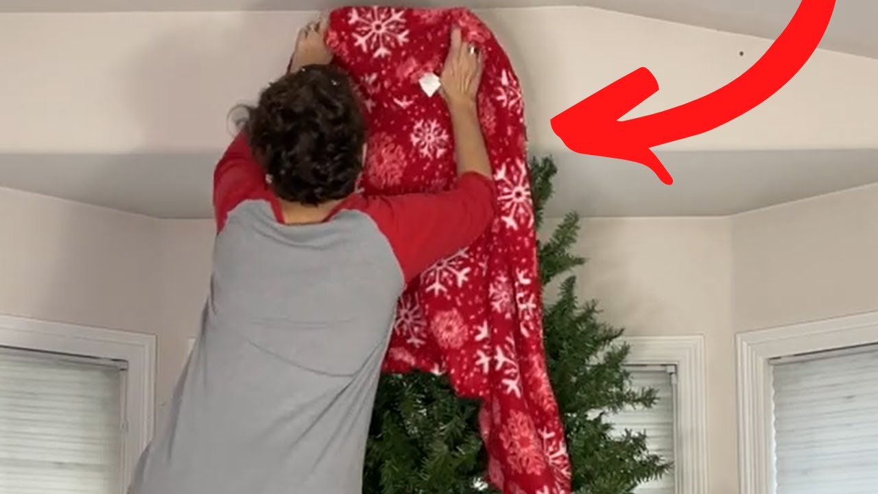 Wrap a blanket around a Christmas tree for an adorable decorating idea!