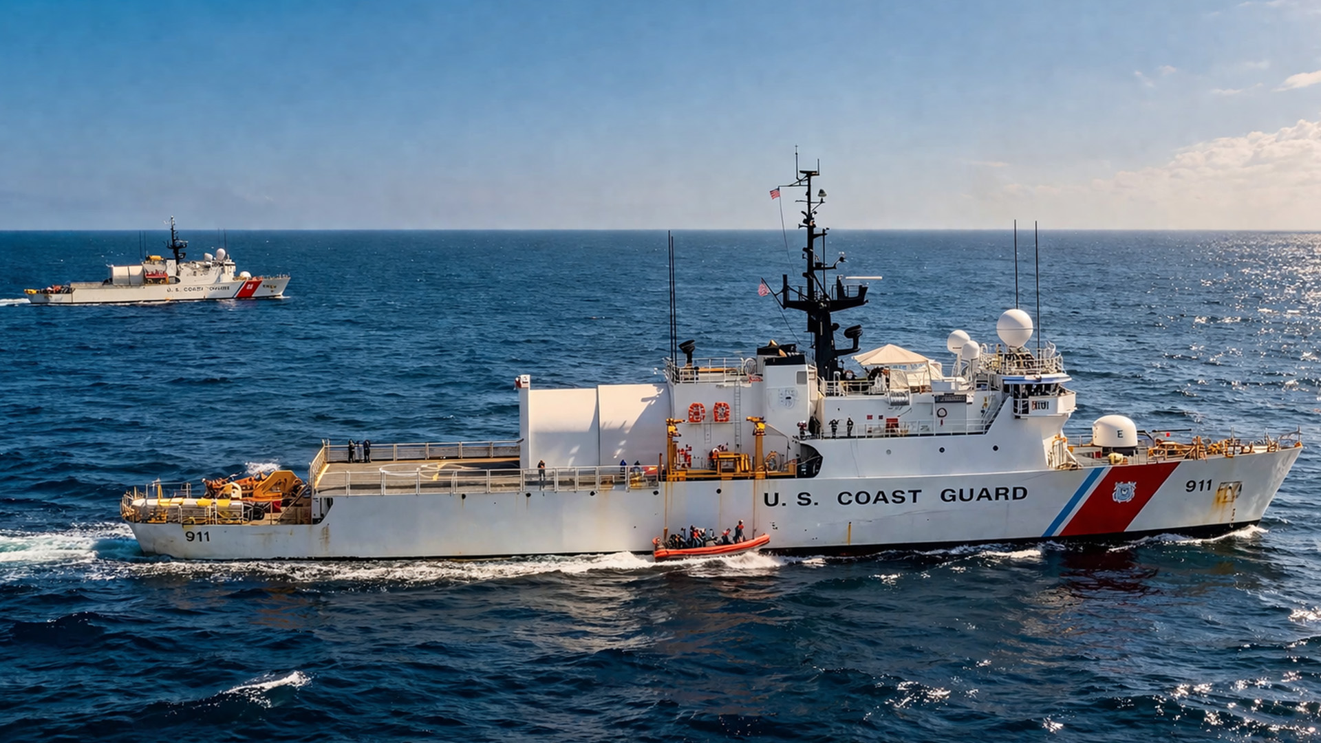Coast Guard cutters Tampa and Forward operate at sea