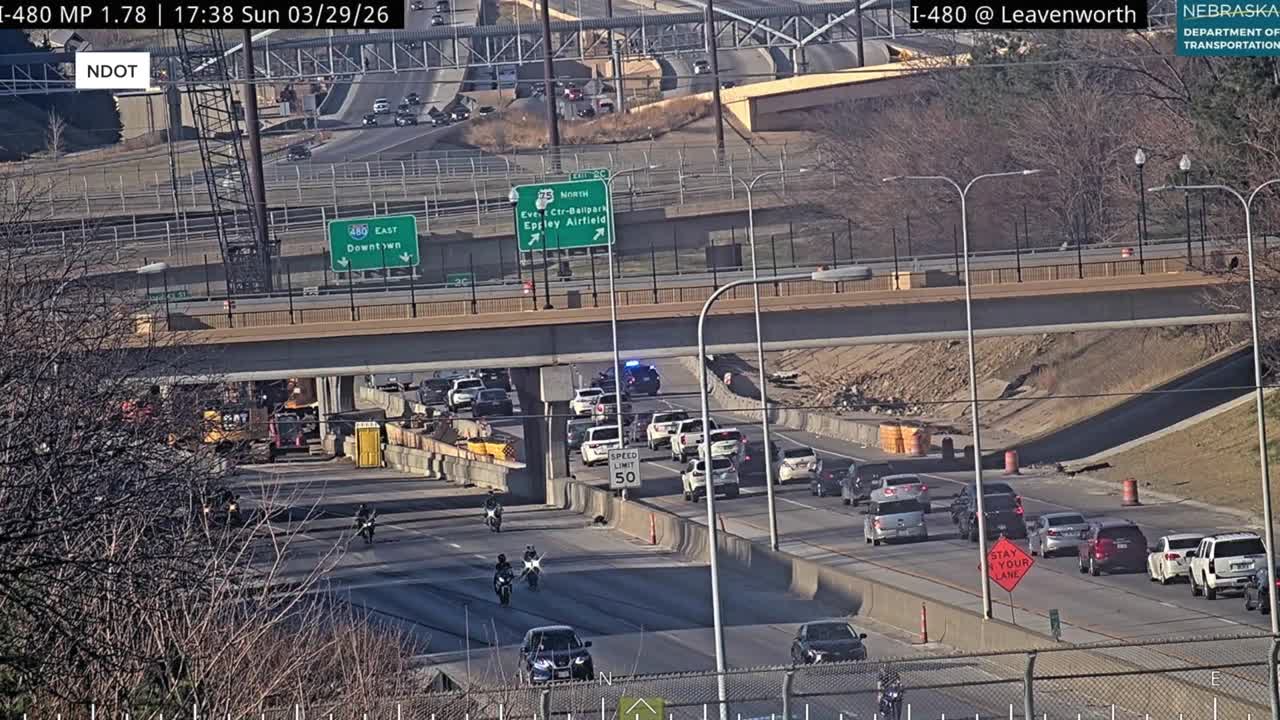 Motorcyclist crashes; falls off highway bridge