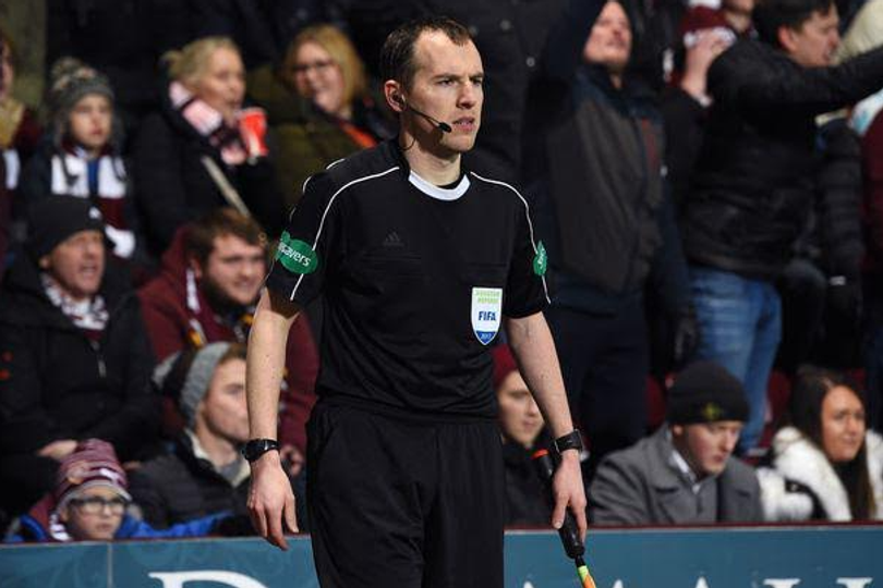 Scottish football referee swaps jeers for cheers as he tackles marathon ...