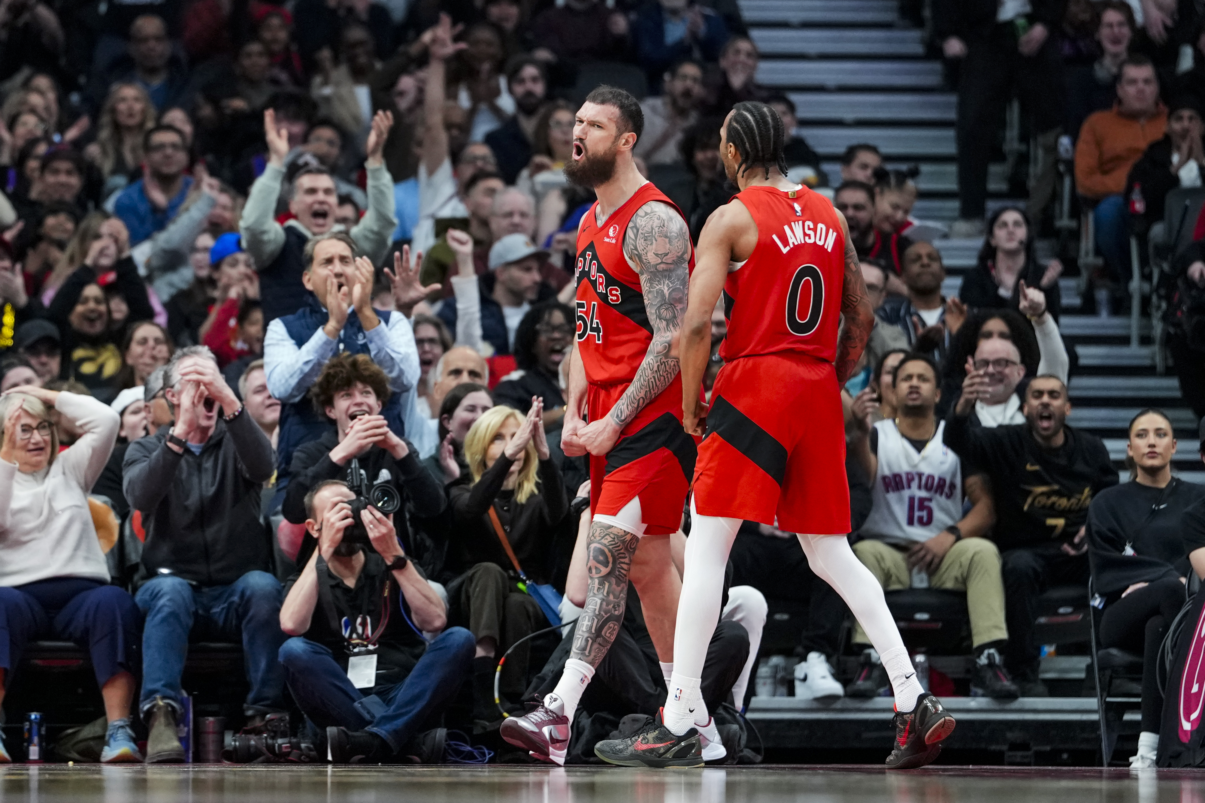 Shorthanded Toronto Raptors win in record-breaking fashion