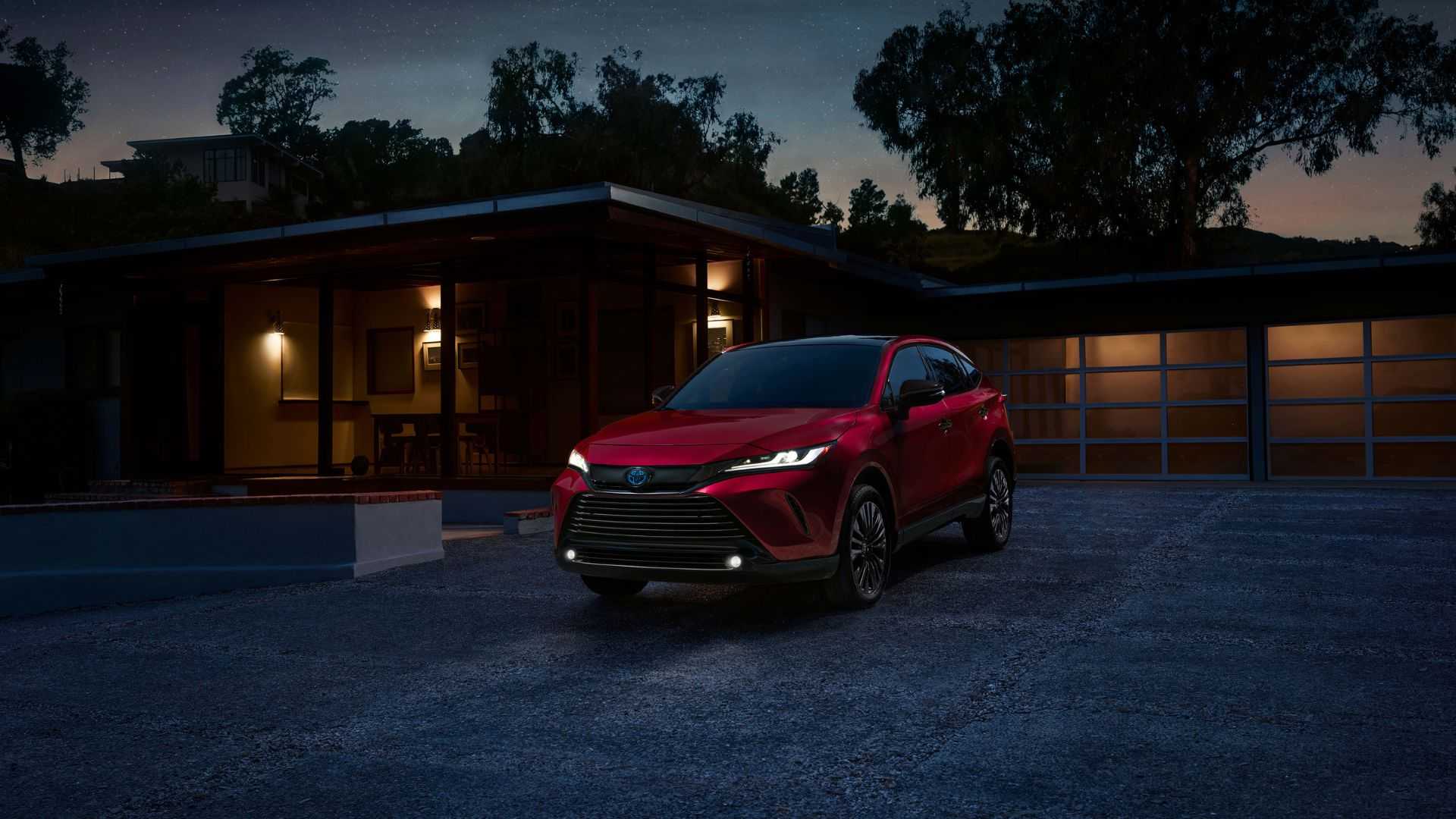Static front 3/4 shot of a red 2024 Toyota Venza Nightshade.