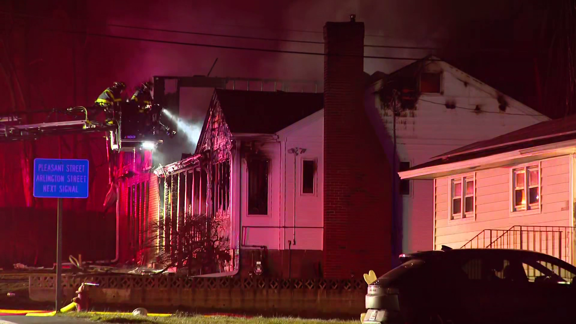 Crews battle house fire in Dracut