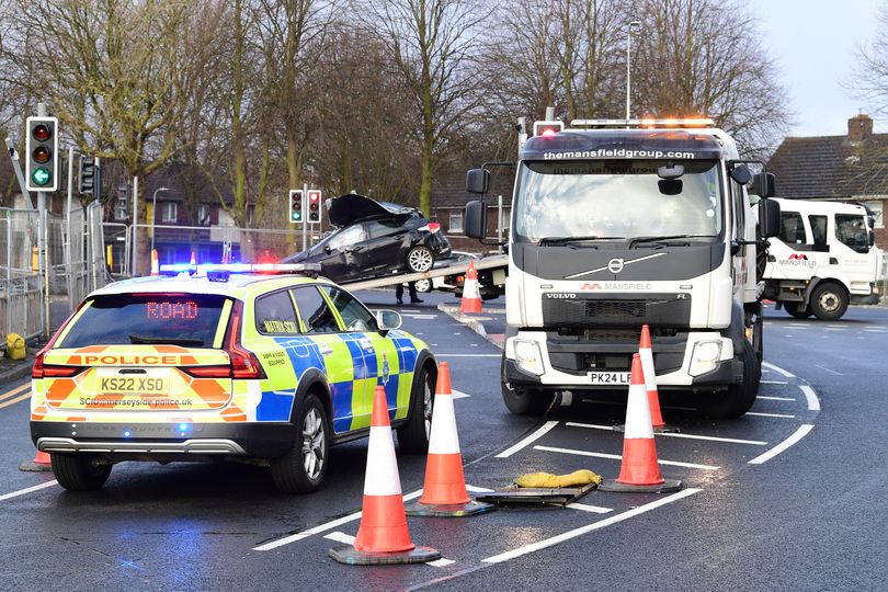 Busy Bootle road closed after two car crash