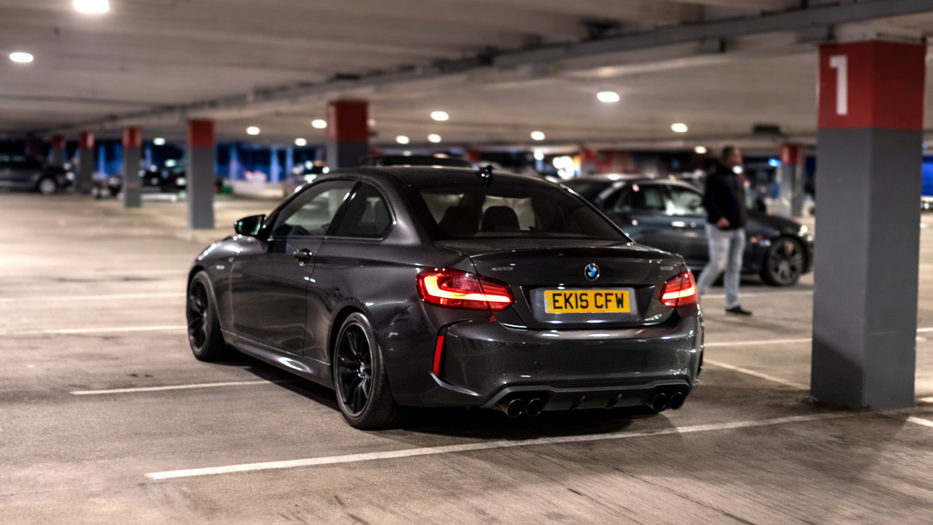 BMW M2 gets too close in tight garage nearly hitting something