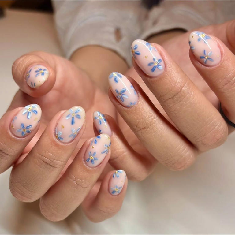Spring's floral nail art features a bouquet of textures and finishes