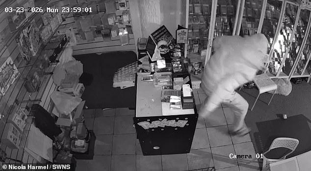 Moment brazen Pokémon raider breaks into gaming shop and steals £20,000 ...