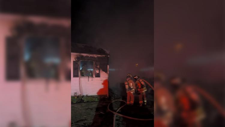 Two dogs dead, nine people displaced after Louisville house fire