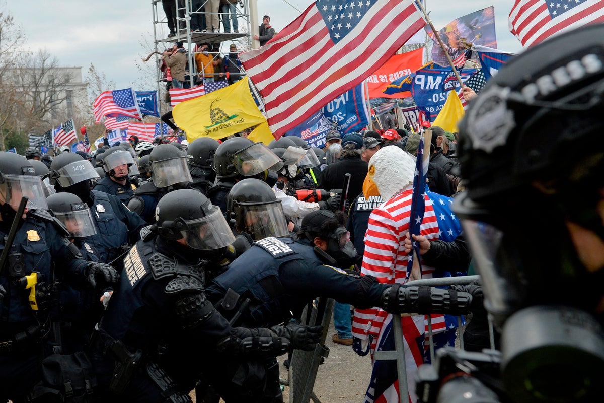 Dozens of Jan. 6 rioters file class-action suit against government