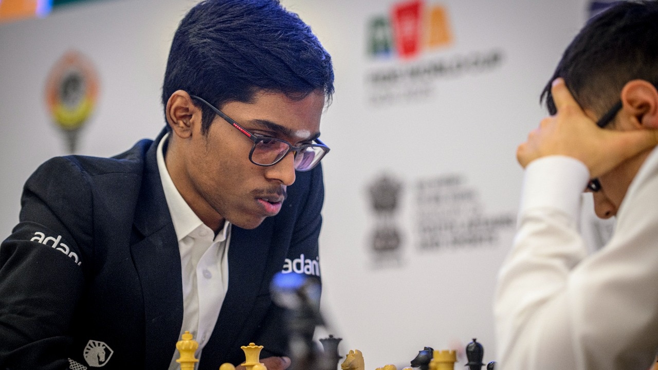 Praggnanandhaa holds joint lead in Candidates after hard-fought draw vs ...