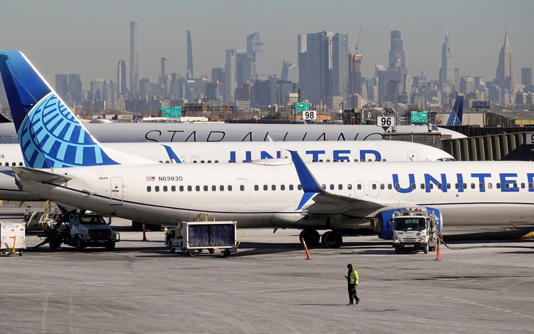 United Airlines cancelled flights because of soaring fuel costs, cutting about 5pc of capacity on routes that are less profitable for the company - Fabrizio Bensch/Reuters