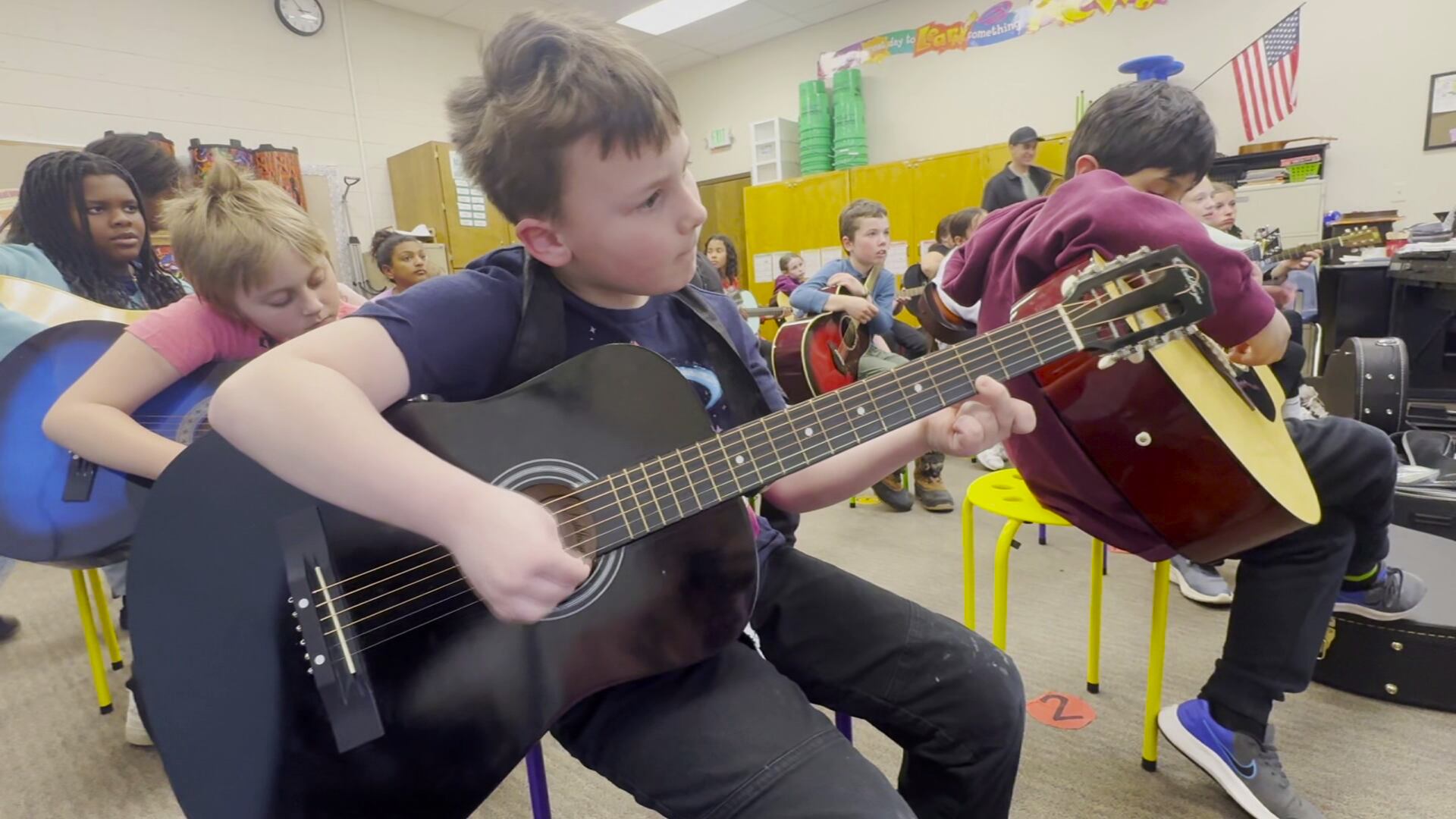 Myhre Guitar Club teaching students lessons in guitar and life