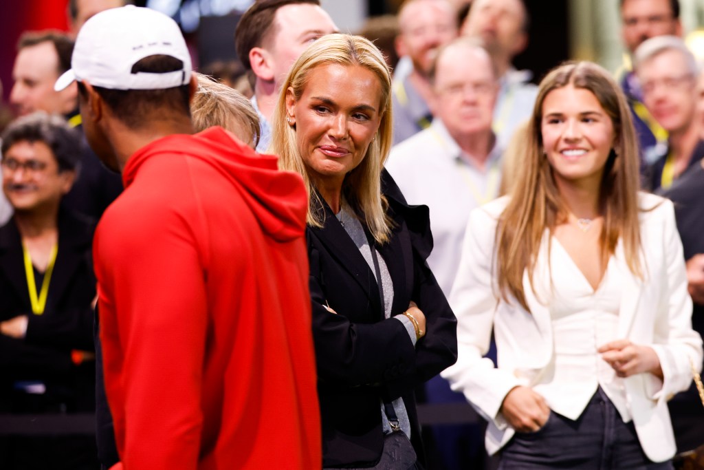 Vanessa Trump, girlfriend of Tiger Woods of Jupiter Links GC and her daughter Kai Trump talk with Woods before a match against The Bay Golf Club at SoFi Center on March 03, 2026 in Palm Beach Gardens, Florida TGL Golf via Getty Images