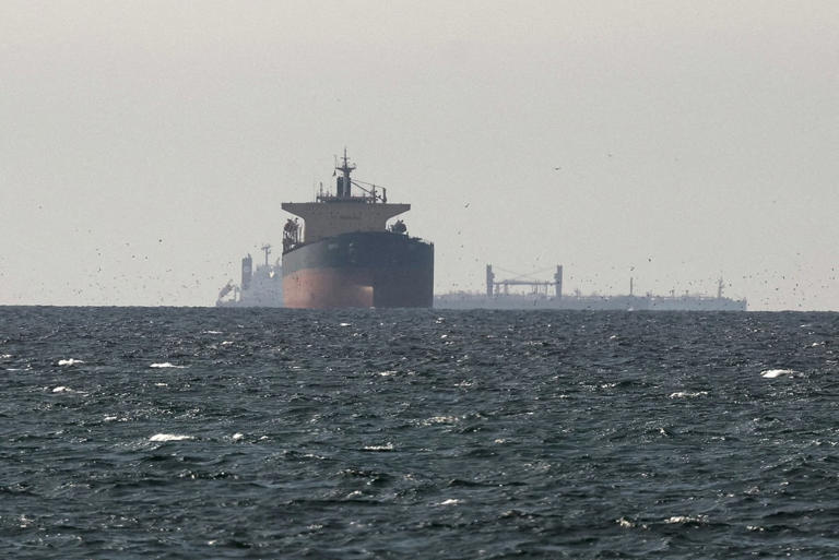 Iranian gunboats fire on ships as Strait of Hormuz closed again