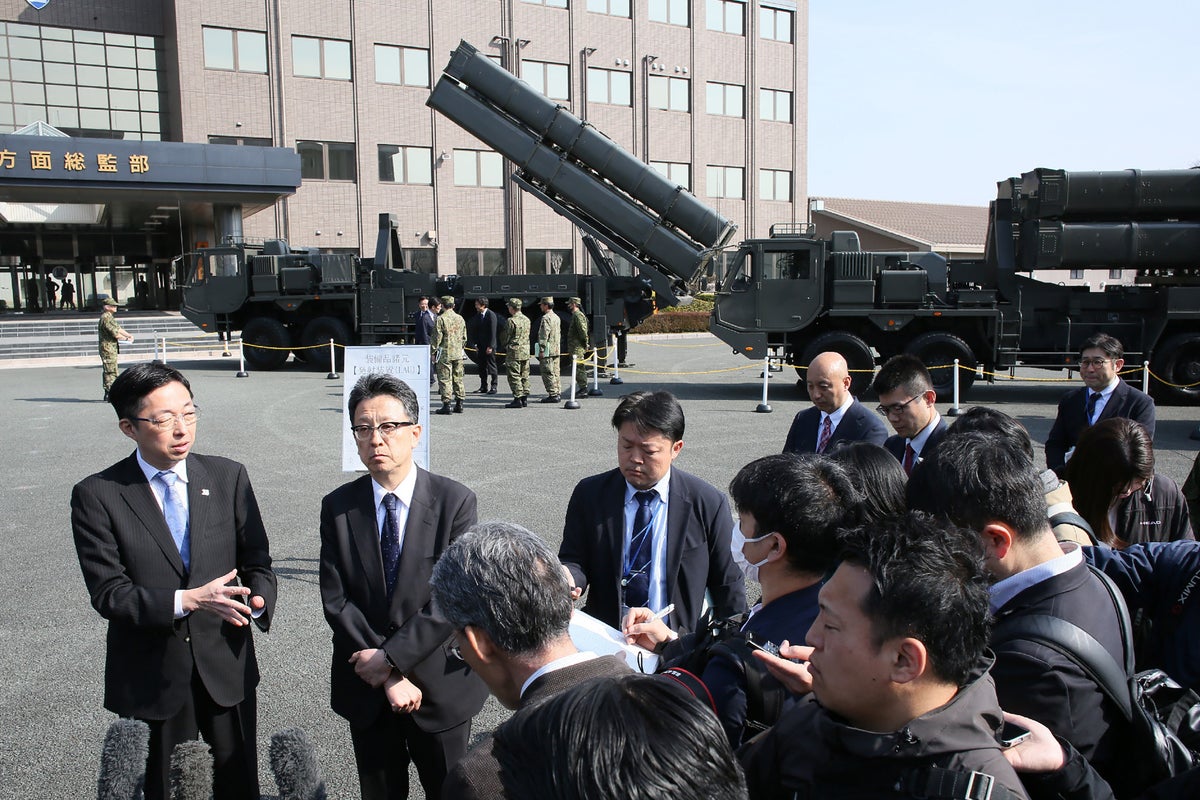 Japan unveils new long-range missiles to defend itself