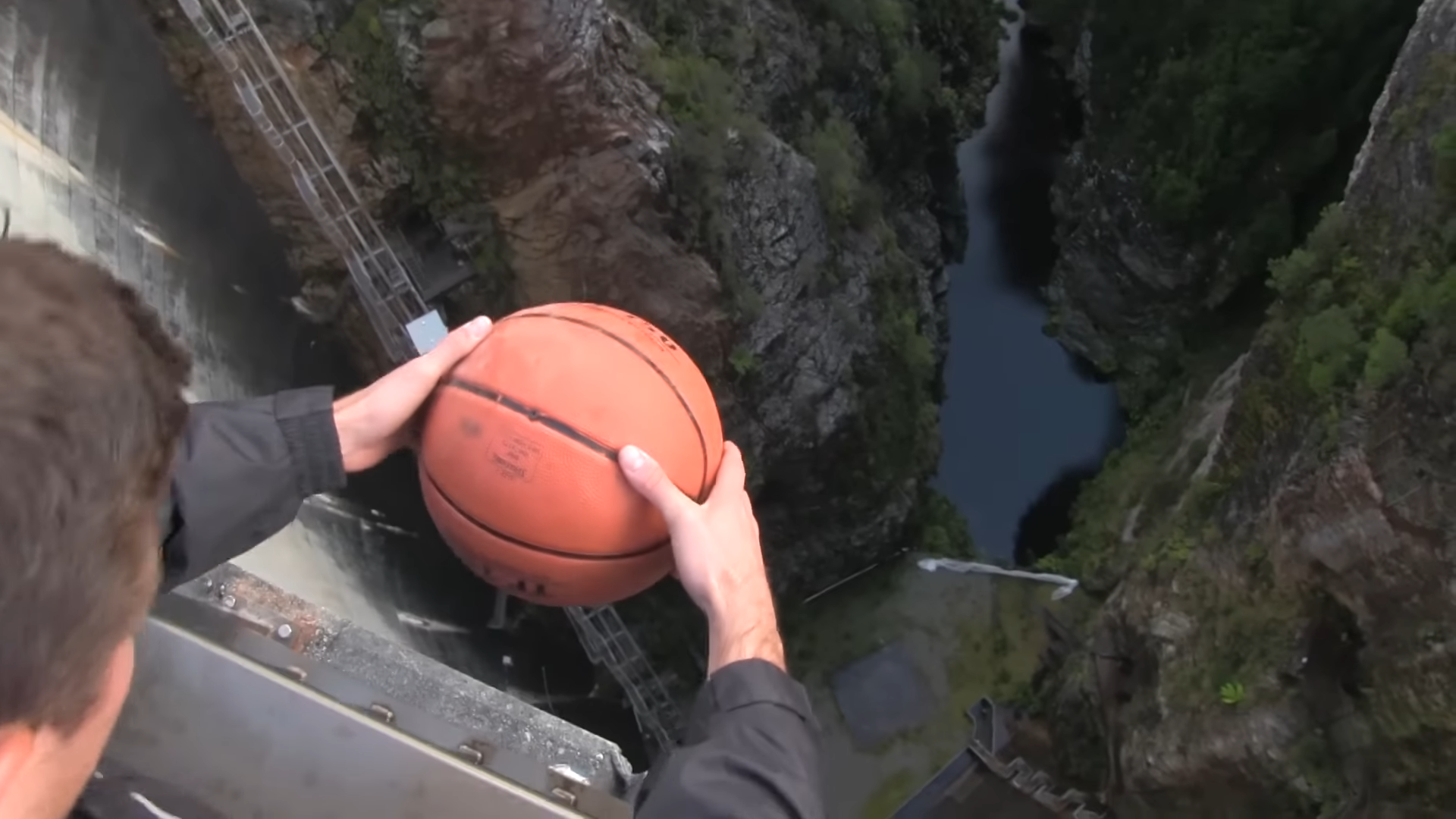 What happens when a spinning basketball falls from 460 feet