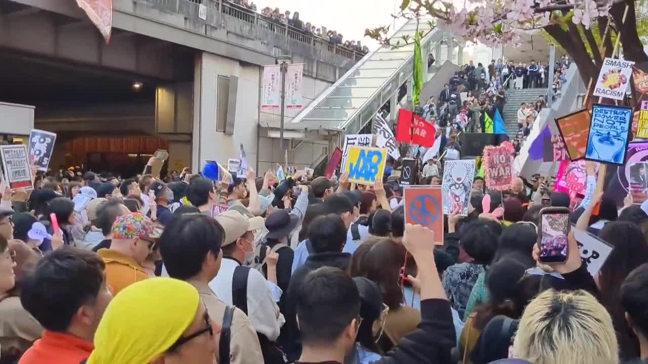 Protesters hold anti-war rave in Shinjuku Square in Tokyo