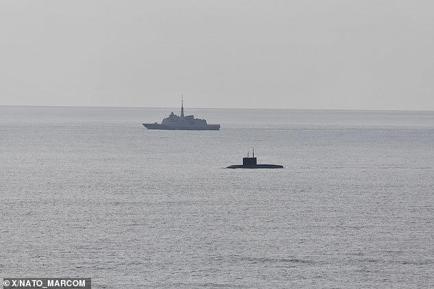 British warship crew scramble to intercept Russian submarine at risk of ...
