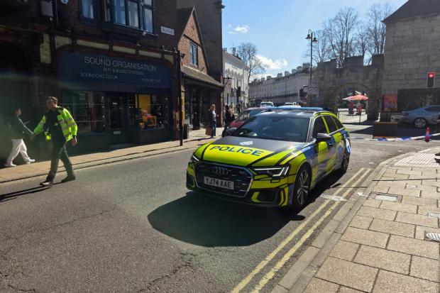 Pedestrian taken to hospital after crash with bus along main street in York