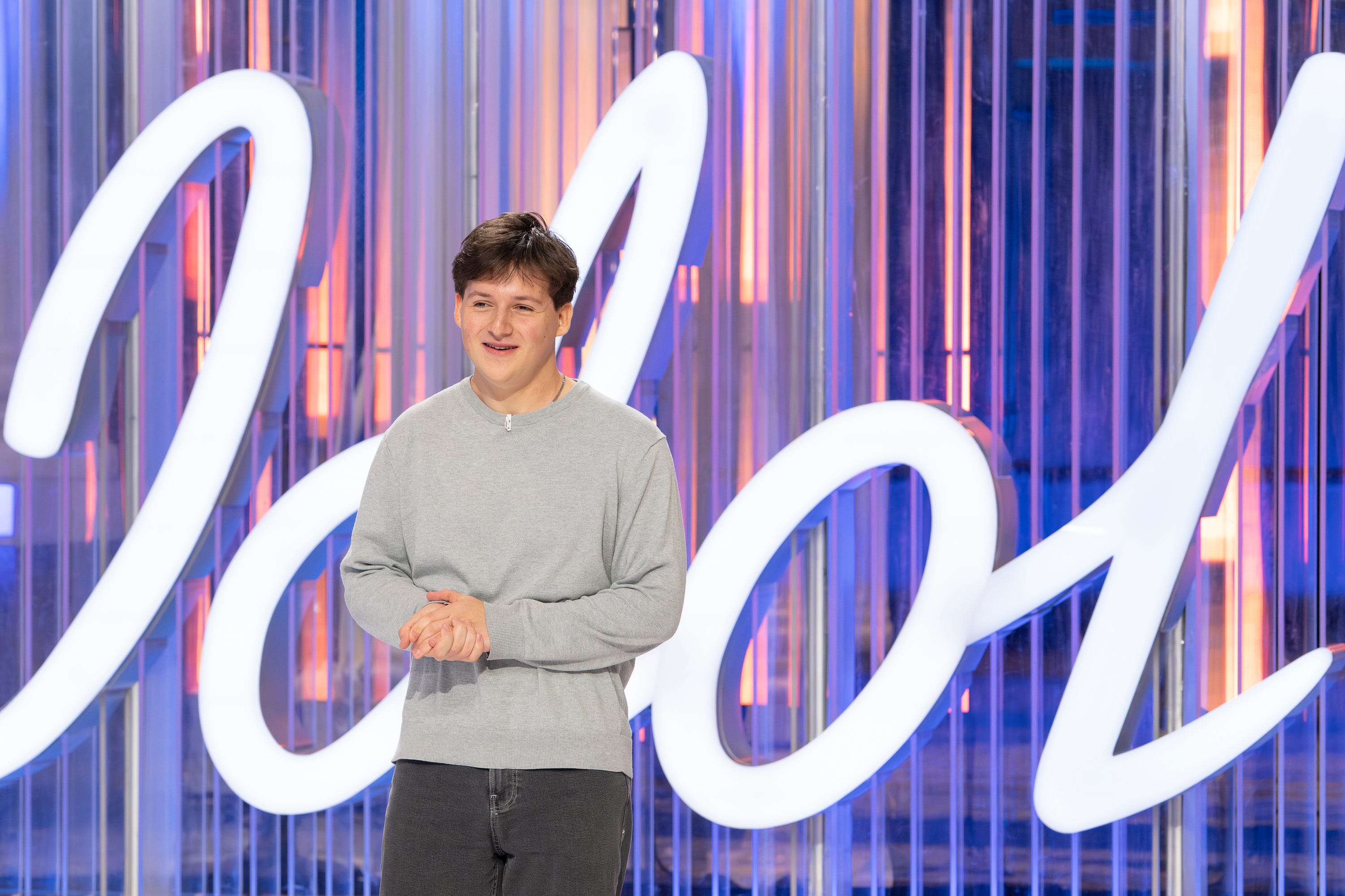 NY contestant makes American Idol top 14. See his performance
