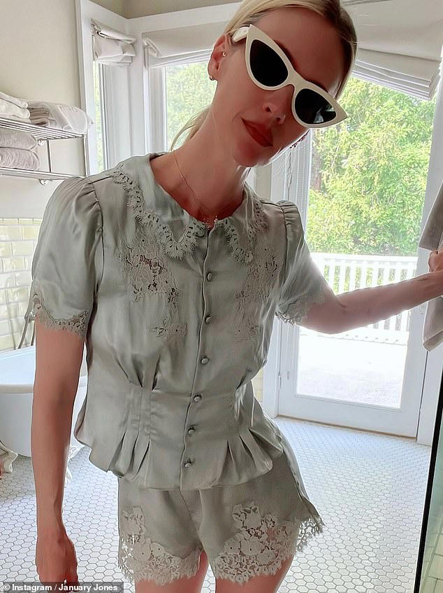 The Mad Men star slipped into a green satin co-ord from Doen with a lace trim as she posed for the sunny images