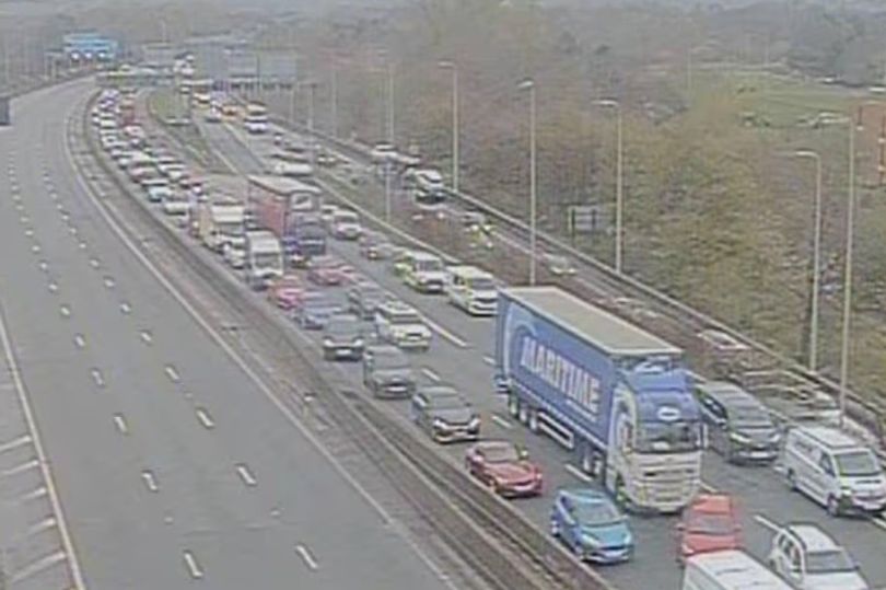 Man dies after falling from bridge as M60 shut for hours