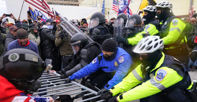 'Peaceful crowd': Man who hurled chairs at cops during Jan. 6 riot sues ...