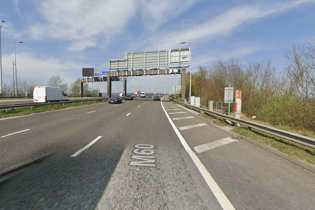 M60 remains closed after man falls from bridge near Trafford Centre in ...