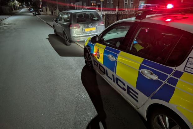 Car spotted going wrong way down street seized by police