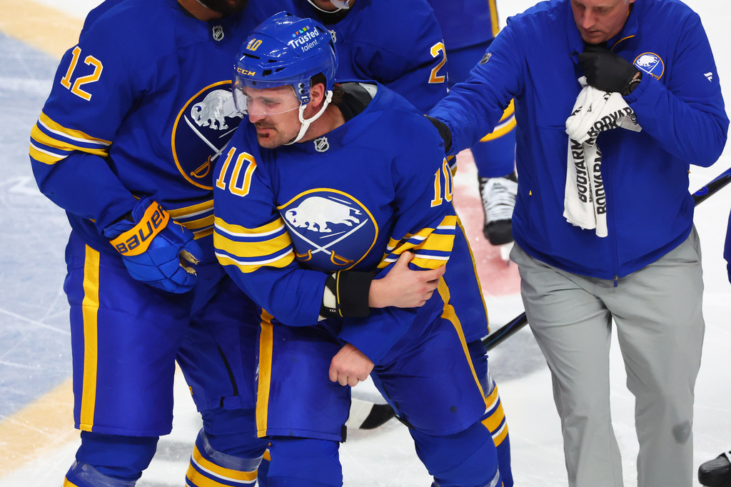 Sabres center Sam Carrick suffers left arm injury in fight with ...