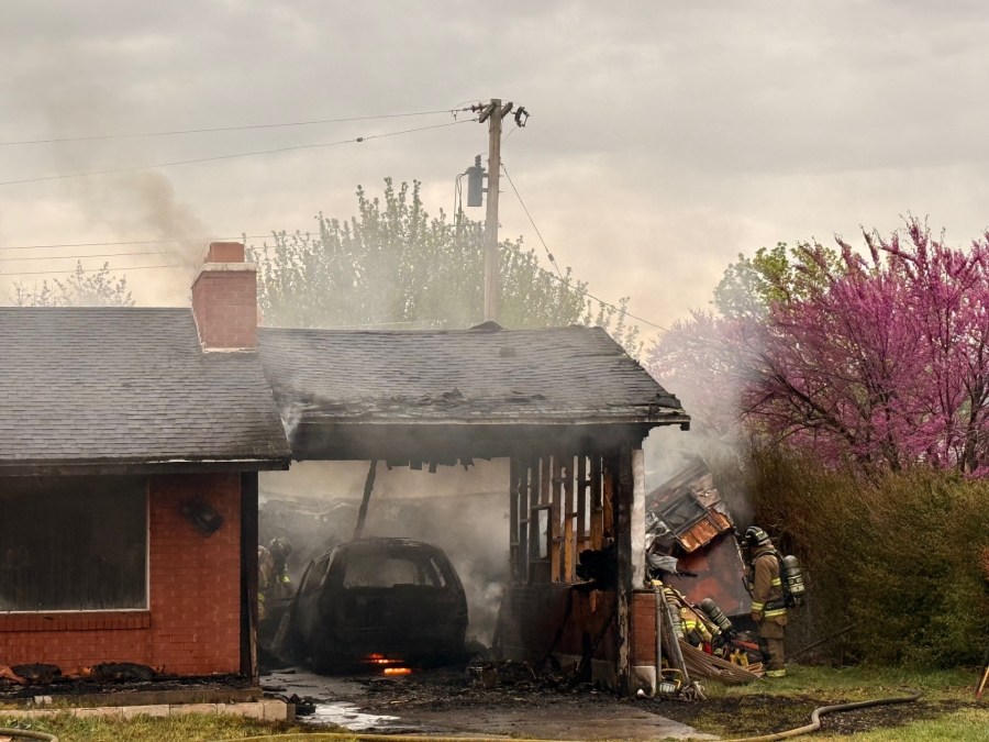 Photos: Fire starts in abandoned home’s carport