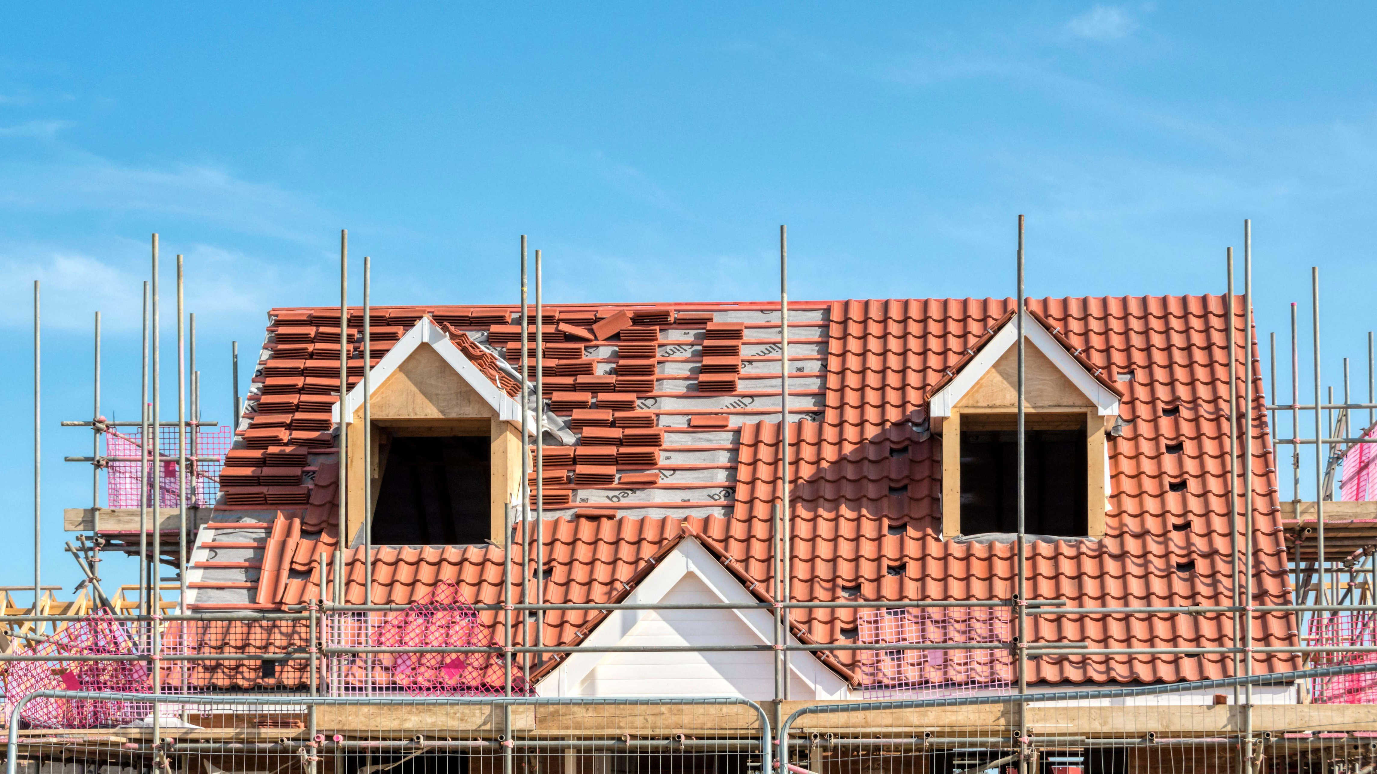 Housebuilder Berkeley to pause buying new land for homes amid global ...