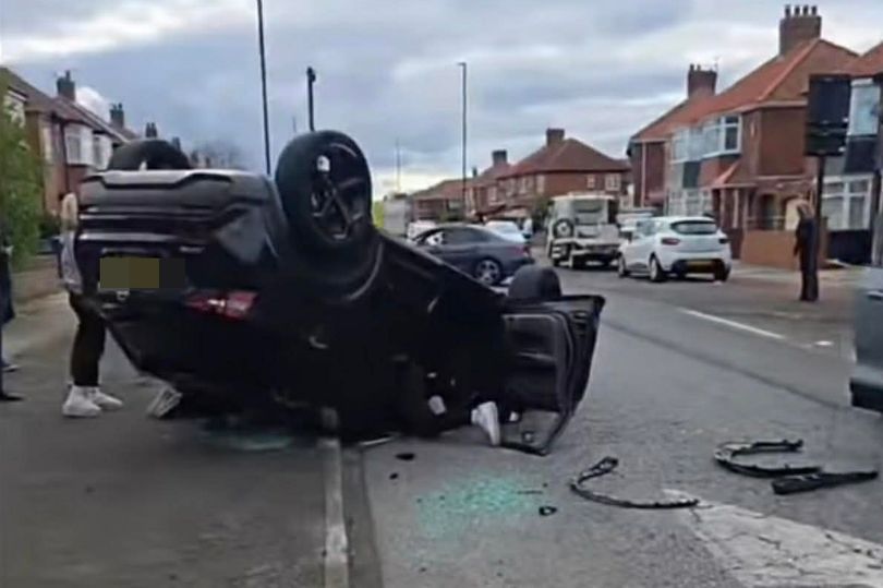 Car flips onto roof in dramatic crash with emergency crews shutting ...