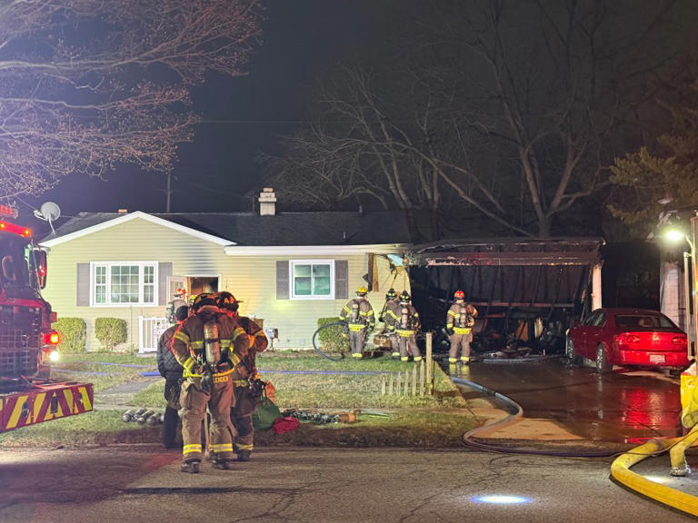 Fire crews respond to early morning house fire in Lansing