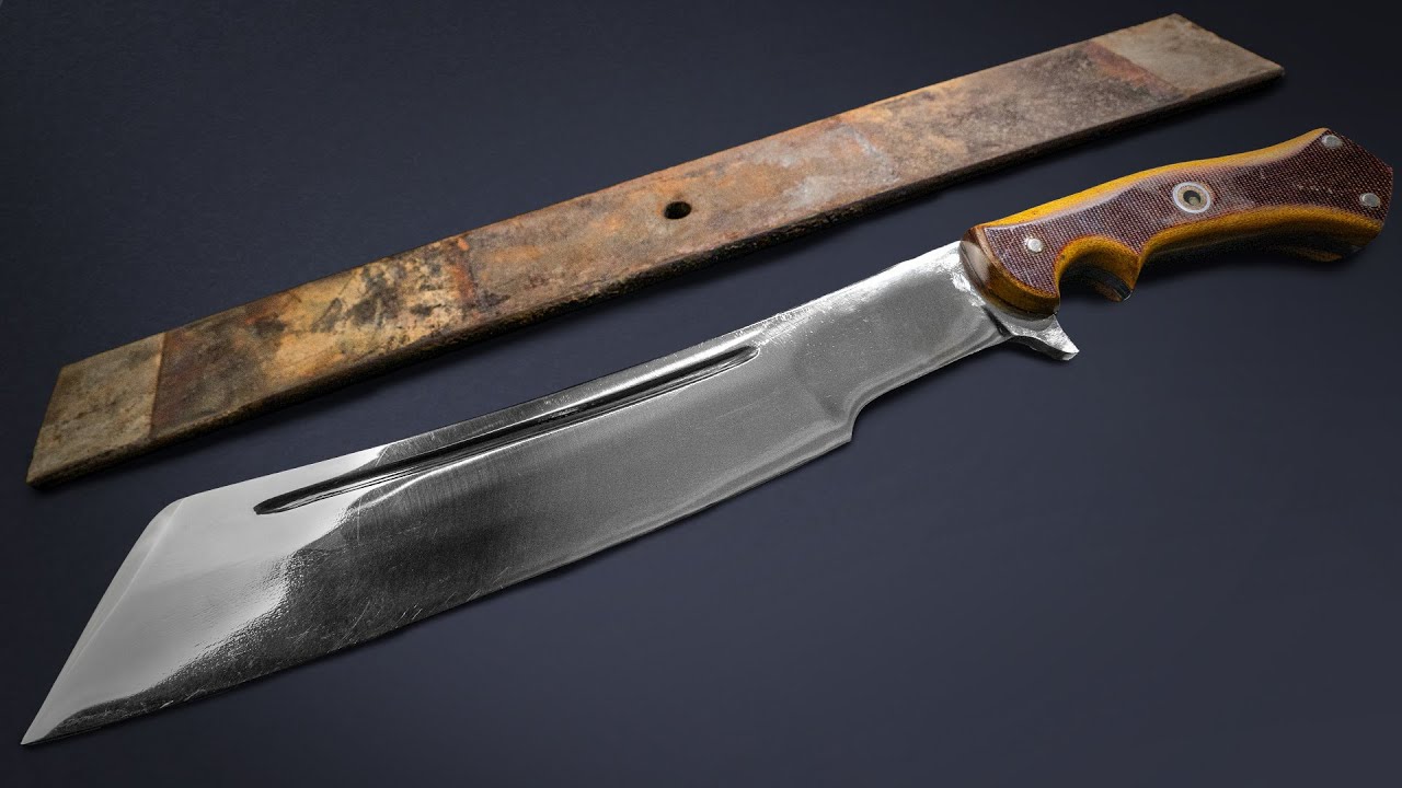 Blacksmith crafts a large cleaver from a recycled metal spring