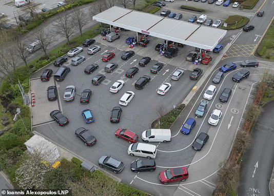 Large queues at a Costco filling station in Manchester today as prices for petrol and diesel soar