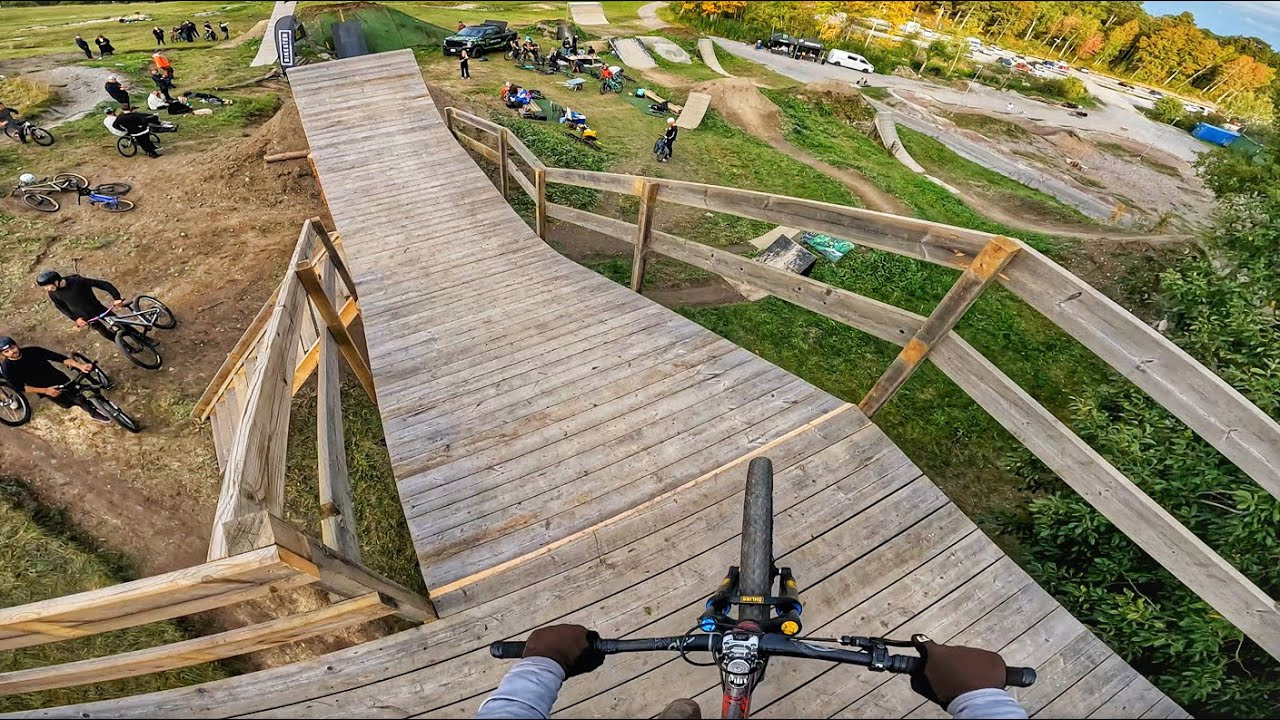Riding new jump lines on a custom bike park