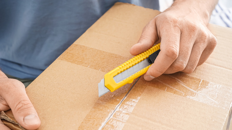 Turn an old cardboard box into unique wall art with this simple DIY