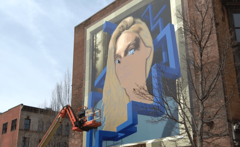 Smiley: City never directed building owner to put up or take down mural