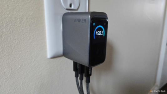 Anker 160W charger charging three devices.