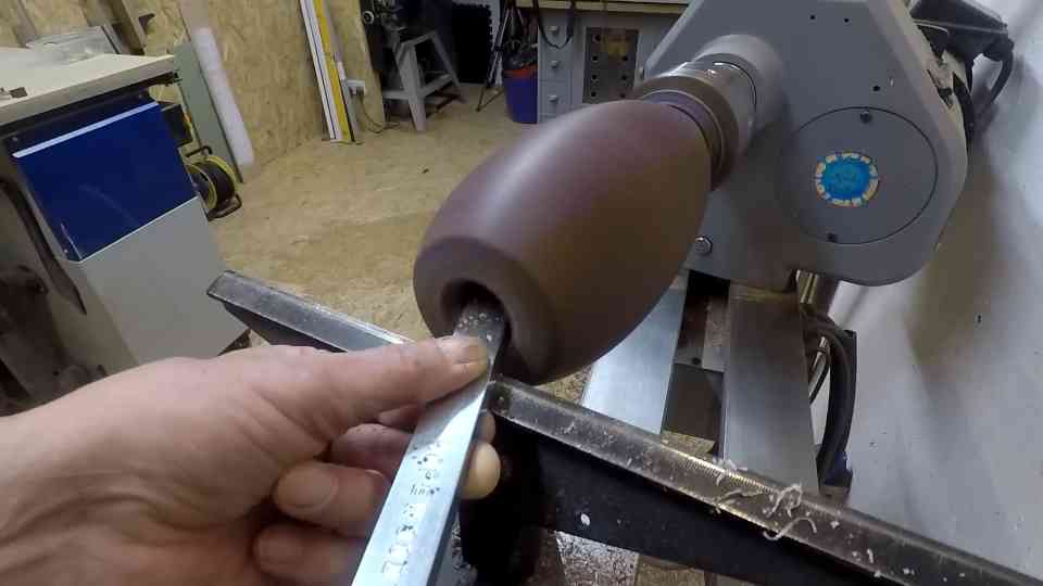 Watch this guy woodturning a waterfall vase