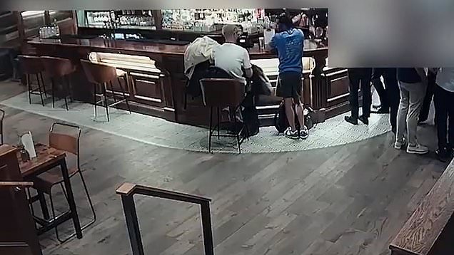Brazen thieves caught on CCTV rummaging through pubgoers' bags for ...