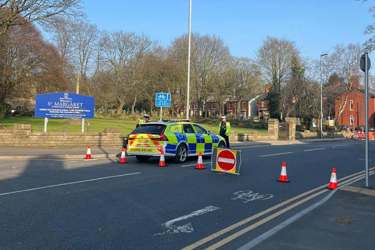 Police issue update after car ploughs into bus stop on busy Greater ...